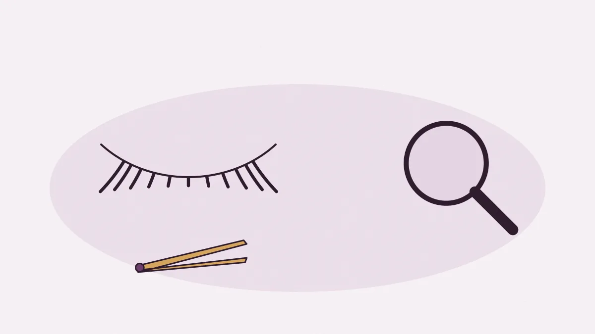 Une paupière aux longs cils, une pince et une loupe